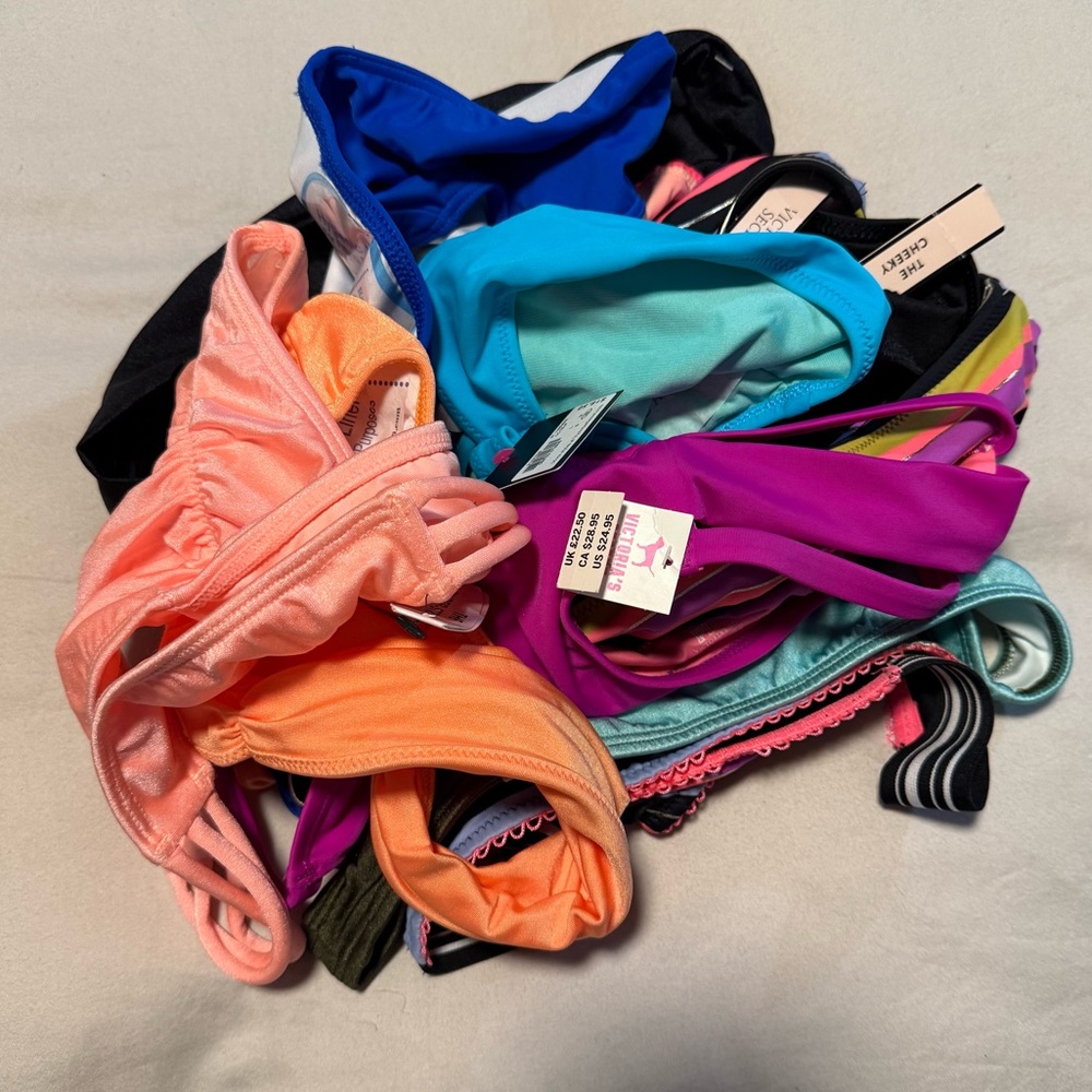Victoria's Secret bikini bottoms lot of 4 random different pieces.